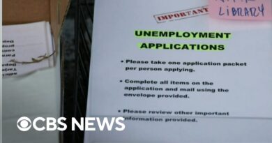 Unemployment claims drop as Fed hikes interest rates